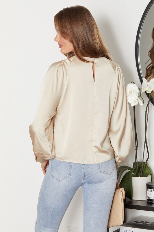 -50% Blusa manga larga satinada